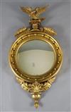 A William IV giltwood and gesso convex wall mirror, W.1ft 10in. H.3ft 5in.                                                             