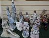 A group of Lladro, Nao and other porcelain figures                                                                                     