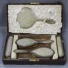 A George V five piece silver and shagreen dressing table set retailed by Goldsmiths & Silversmiths Co, London 1924                     