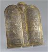 Judaica: A 19th century Cairoware arched plaque inscribed with the Ten Commandments, width 11.25in., height 13.25in.                   