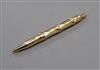 A Cartier 14ct yellow metal 'bamboo' pattern ballpoint pen.                                                                            