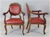 A set of six mid 19th century Anglo Indian carved padouk elbow chairs, W. 2ft. H.3ft 1in.                                              