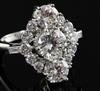 An attractive 18ct white gold and diamond cluster elliptical shaped ring, size M/N.                                                    