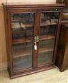 A late Victorian two door cabinet W.84cm                                                                                               