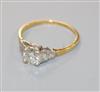 A 1940's 18ct gold, platinum and single stone diamond ring with graduated baguette cut diamond set shoulders, size I.                  