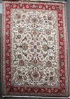 A large Persian Ivory ground carpet, 13ft 3in by 9ft 5in.                                                                              