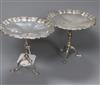 A pair of George V silver miniature occasional tables with piecrust borders, Mappin & Webb, Sheffield, 1925, height 97mm.              