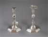 A pair of modern 18ct century design silver dwarf candlesticks by Rodney C. Pettit, London 1985, ( one sconce missing), 16cm.          