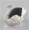 An Edwardian silver novelty swan pin cushion, by Grey & Co, height 85mm.                                                               