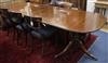 A Regency style banded mahogany two pillar extending dining table W.274cm                                                              