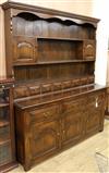 An 18th century style oak dresser and rack W.167cm                                                                                     