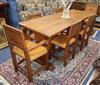 Thomas "Gnomeman" Whittaker of Littlebeck, a rectangular adzed oak dining table and six chairs (2 with arms) table length 183cm        