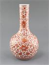 A Chinese iron red painted bottle vase, Qianlong mark but late 19th/early 20th century, height 25.8cm                                  