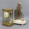 An onyx four glass clock and a skeleton clock                                                                                          