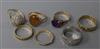 Four various 9ct gold textured rings, one gypsy-set, a 9ct gold and amethyst ring, a similar amber ring and a modernist ring (7).      