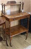 A Victorian walnut three-tier whatnot with fitted writing drawer W.59cm                                                                