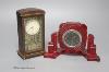 A Russian moulded red acrylic mantel timepiece, width 19cm, and a Secessionist style beech cased timepiece                                                                                                                  