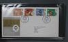 An accumulation of stamps and covers in albums and loose,                                                                              