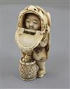 A Japanese ivory netsuke of a shishimai dancer, Meiji period, signed Nagatame, h. 5.1cm                                                