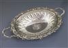 A good George III Sheffield plate two-handled embossed oval fruit bowl, with rose and gadrooned border, crested, 49.7cm                