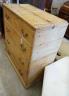 An early 19th century pine "Scottish Press" with hinged top over two drawers, width 92cm, depth 49cm, height 105cm                                                                                                          