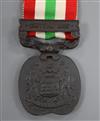 A bronze Jummoo and Kashmir medal 1895, unnamed.                                                                                       