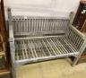 A small weathered teak slatted garden bench, length 114cm, depth 56cm, height 90cm                                                                                                                                          