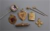 Two 9ct gold watch fobs, a 9ct gold cross pendant, another pendant, a 9ct gold propelling pencil and three stickpins.                  