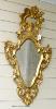 An 19th century style Italian gilt carved wood wall mirror. W-50, H-89                                                                                                                                                      