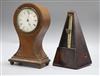 A balloon mantel clock and metronome Clock H.24cm                                                                                      