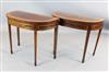 A pair of George III style satinwood banded mahogany D shaped card tables, W.3ft 11.5in. D.1ft 5in. H.2ft 5in.                         