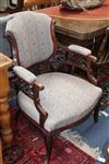 A pair of Victorian armchairs                                                                                                          