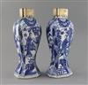 A pair of Chinese blue and white canted rectangular baluster vases, Kangxi period, H.26.7cm, one neck with section lacking obscured by 