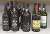 Thirteen assorted bottles of Port including Dow's 1975 and 1977 and one bottle of Magloire Calvados                                                                                                                         