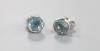 A cased modern pair of Theo Fennell 18ct white gold and blue topaz set ear studs                                                                                                                                            