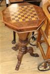 A Victorian walnut trumpet work table with chequer top W.45cm                                                                          