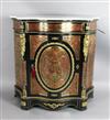 A 19th century French red boulle and ebonised serpentine pier cabinet, W.3ft 7in. D.1ft 6in. H.3ft 6in.                                