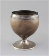 A George III silver mounted pedestal coconut cup, by Phipps & Robinson, height 13.4cm.                                                 