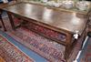 An oak refectory table W.216cm                                                                                                         