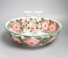 A Wemyss pottery Cabbage rose decorated toilet bowl, diameter 39cm, and a pair of Weymss style candlesticks by Griselda Hill pottery                                                                                        