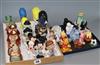 A collection of novelty salt and pepper pots, including Disney characters                                                              