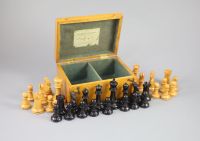 A Jaques & Son Staunton 3 1/2" boxwood and weighted chess set in original golden oak box, c.1910, 8 x 5.75 x 3.5in.                    