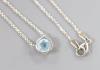 A modern Theo Fennell 18ct white gold and solitaire blue topaz set pendant necklace                                                                                                                                         