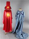 The Magic Flute: Two brightly coloured satin appliqué cloaks, a blue appliqué dress, two leather jackets,                              