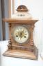 A German Black Forest mantel clock with pendulum 34.5cm                                                                                                                                                                     