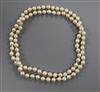 A single string cultured pearl necklace, 70cm.                                                                                         