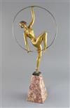 Attributed to G. Limousin. An Art Deco gilt metal figure of a hoop dancer, height 21in.                                                