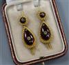 A pair of late Victorian etruscan style yellow metal, cabochon garnet and diamond set pear shaped tassel drop earrings,                