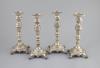 A set of four early 19th century South American? cast silver candlesticks                                                                                                                                                   