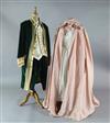 The Marriage of Figaro: A rail of green velvet gold trimmed tail coats and trousers, similar pale blue silver                          